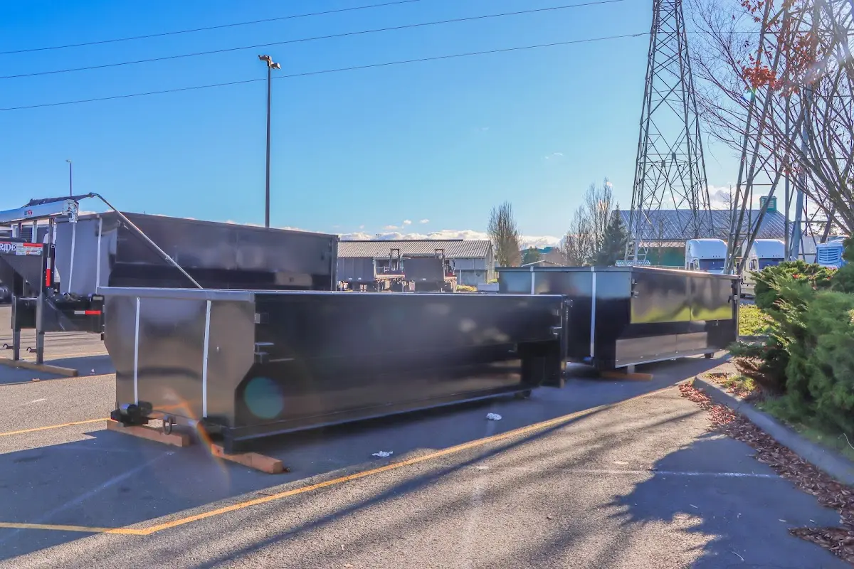 Roll-off dumpster ready for waste disposal at job site for Concrete Dumpster Rental in Aptos